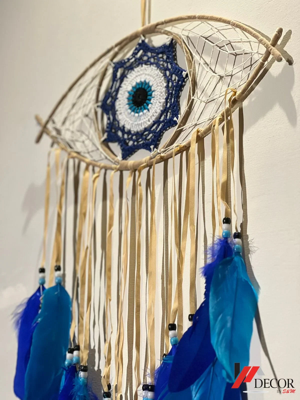 Handwoven Evil Eye Wall Art with Feathers