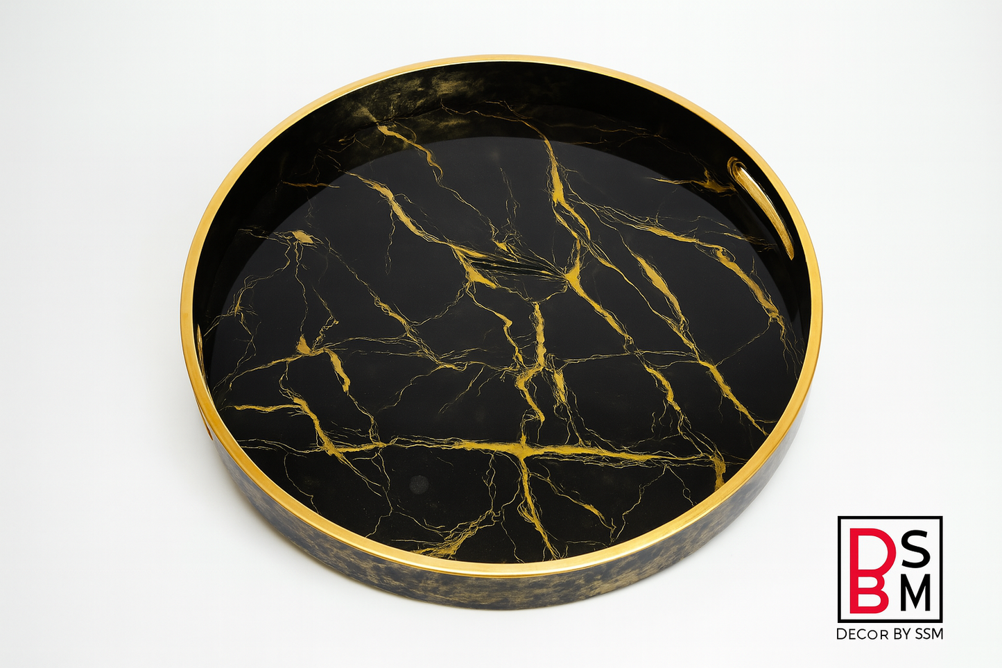 Black marble-effect serving tray with golden rim on white background
