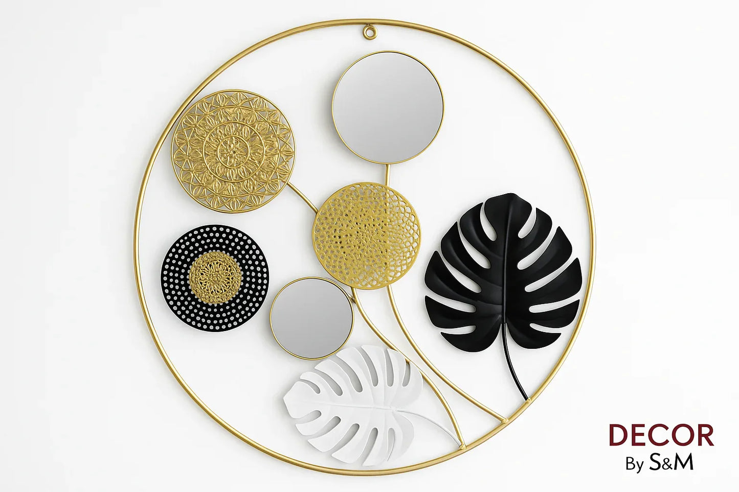 Circular gold wall art with geometric and botanical elements on white background