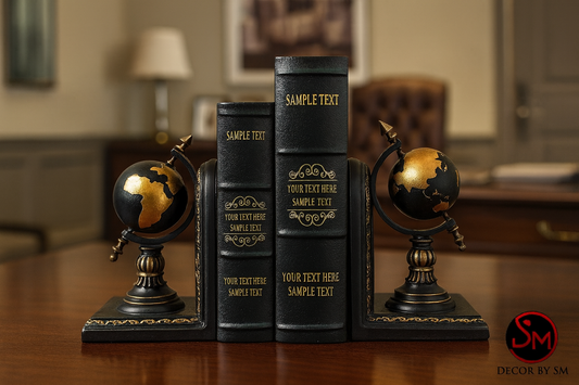 Black and gold globe bookends on executive office desk