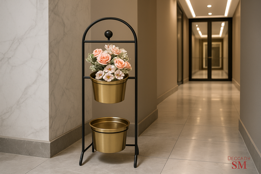 Black metal tiered planter stand in entrance lobby corner