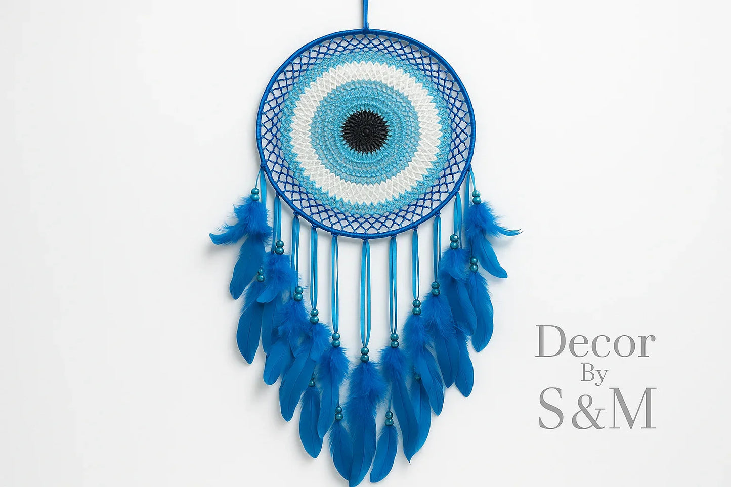 Blue dreamcatcher with white background and watermark