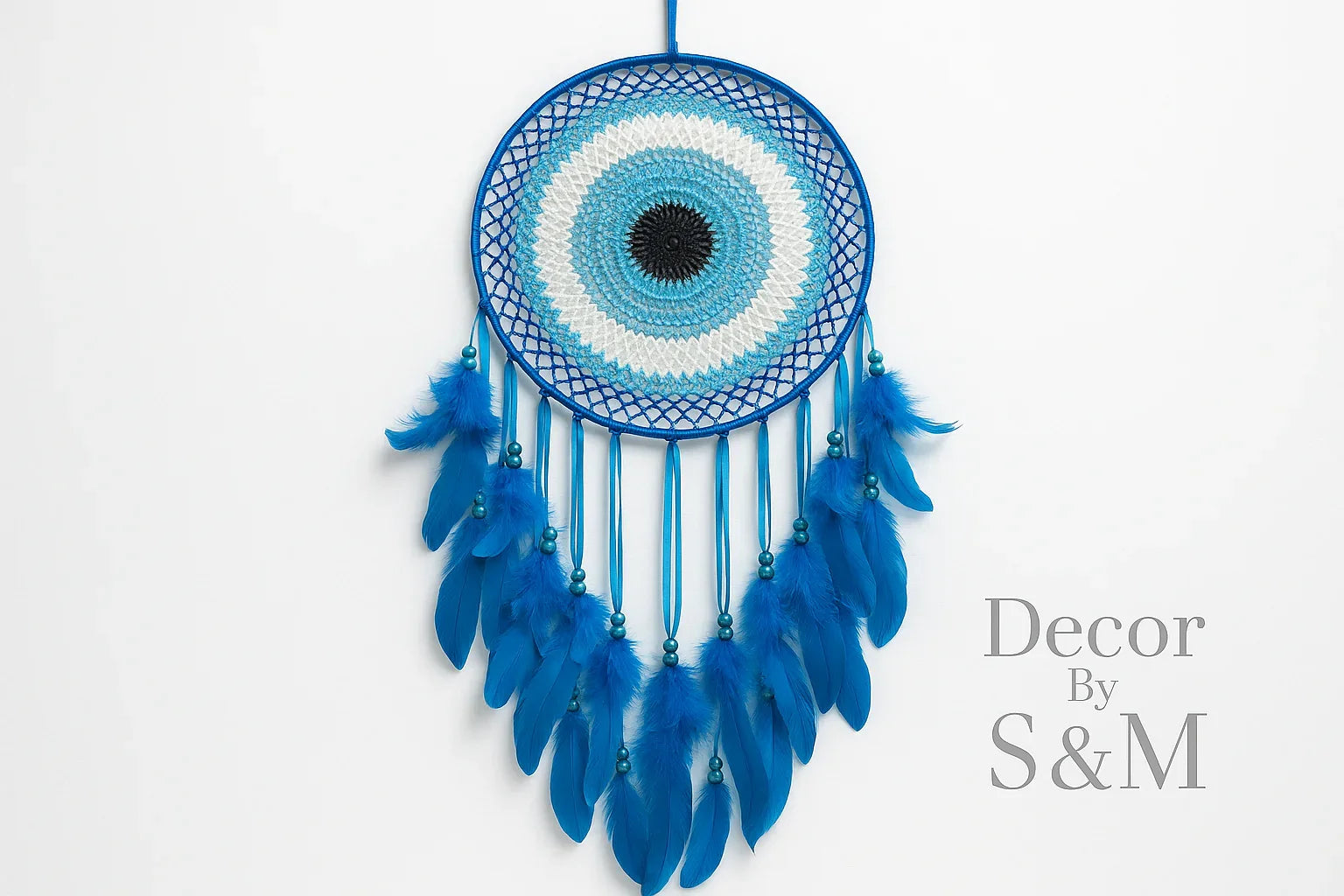 Blue dreamcatcher with white background and watermark