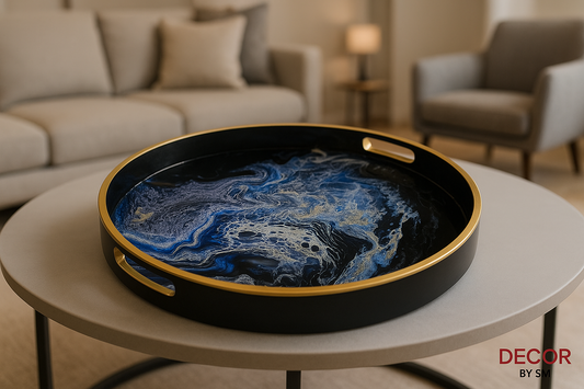 Blue marble-effect serving tray with gold handles on modern coffee table