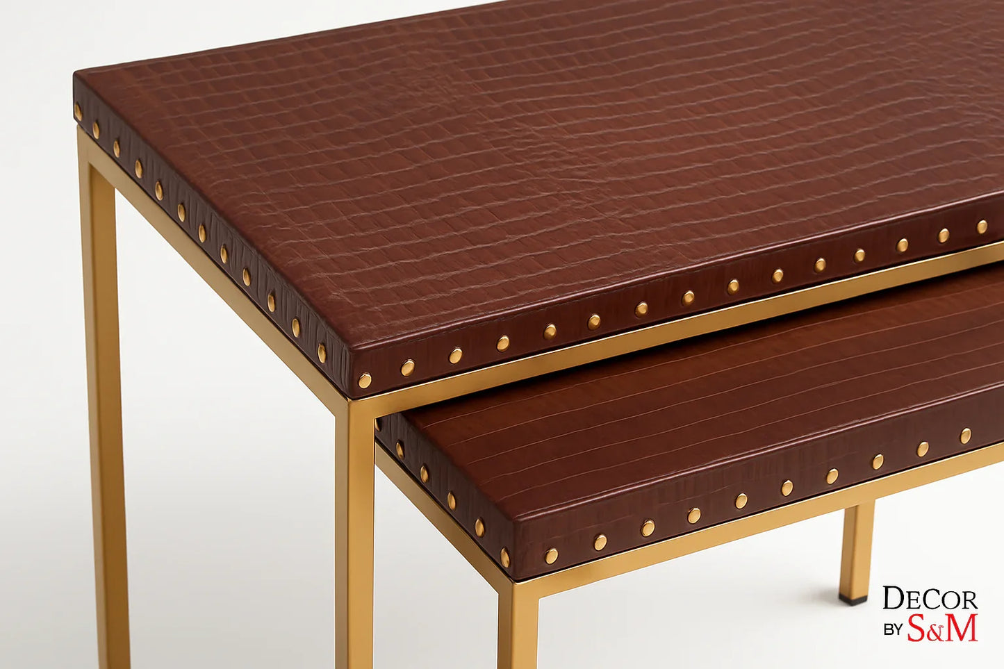Close-up detail of leather top with gold studs on white background
