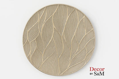 Decorative plate with intricate leaf engravings on white background