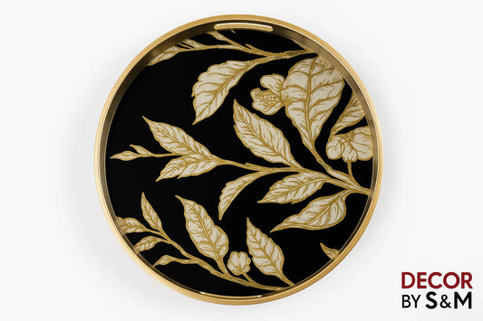 Elegant serving tray with gold botanical design on black background