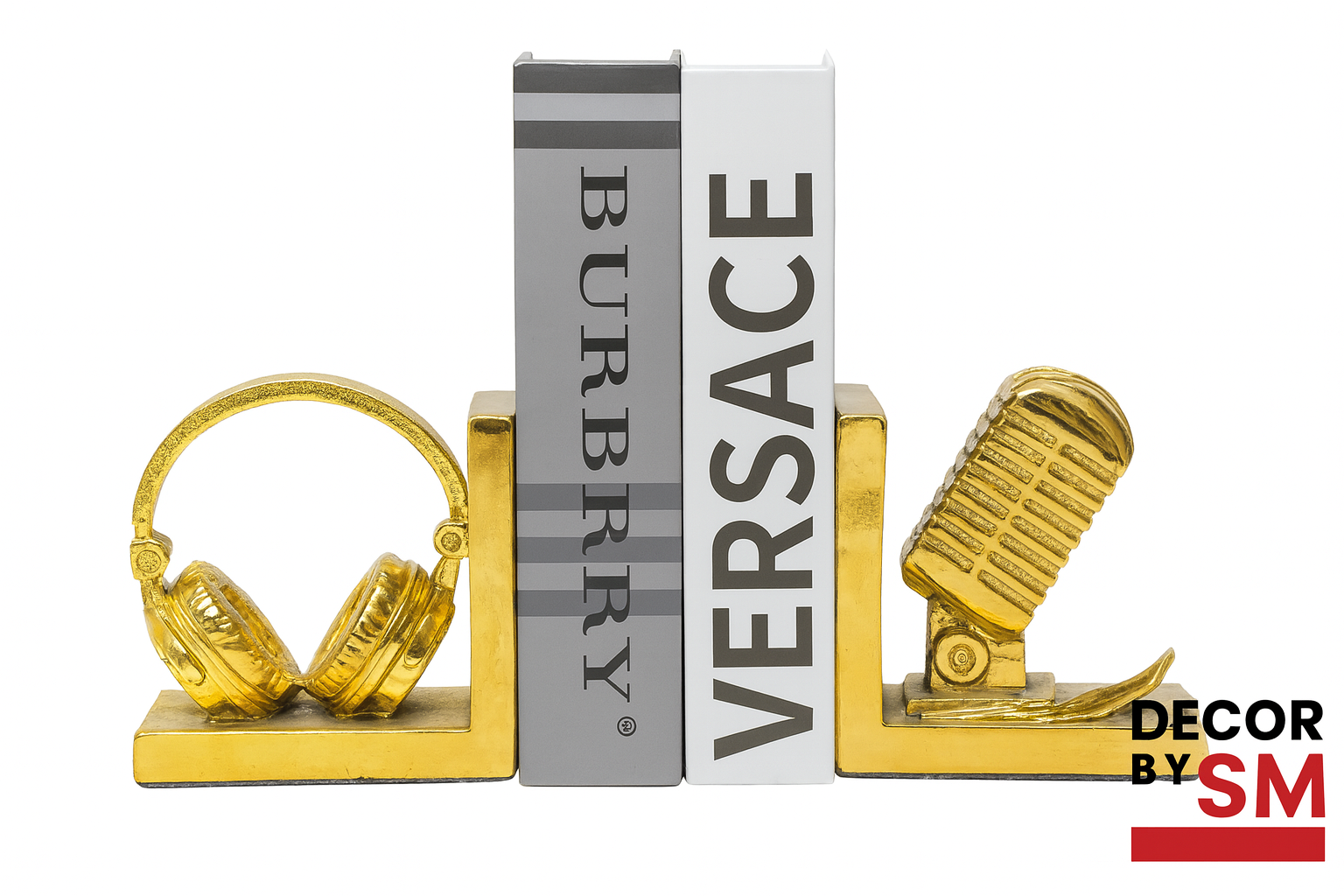 Golden bookends with headphones and microphone on white background