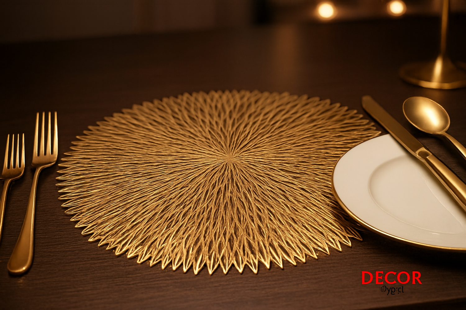 Golden sunburst pattern table mat with gold cutlery on dining table