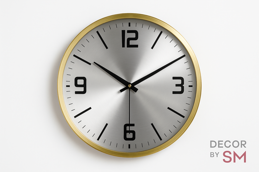 Golden wall clock on white background