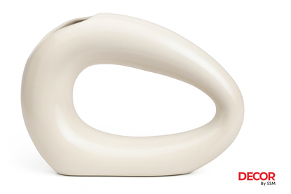 Modern abstract ceramic sculpture with horizontal opening on white background