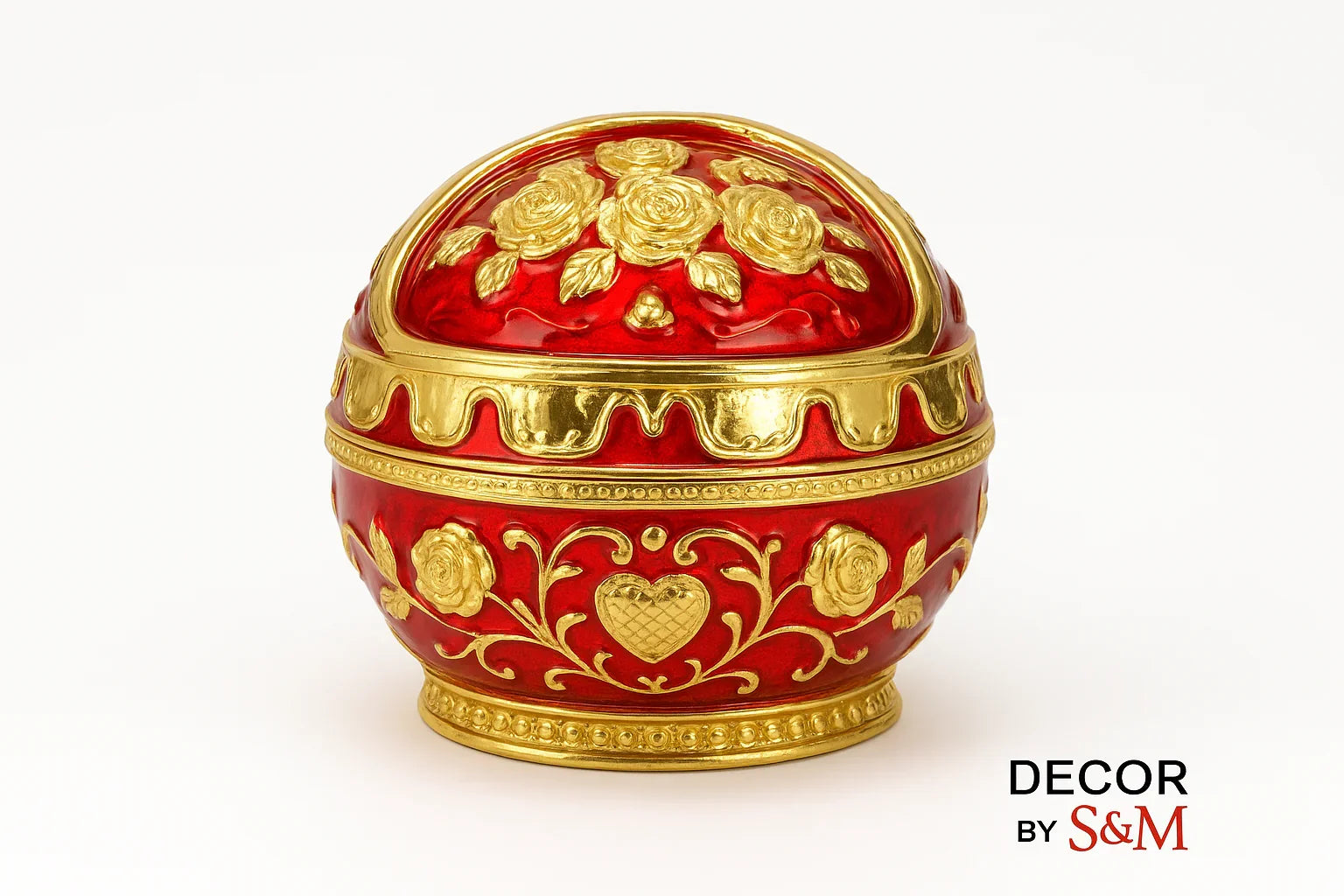 Ornate red and gold decorative egg with intricate patterns on white background