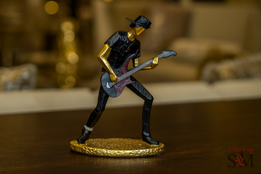 Rock guitarist figurine on dark wood console in luxurious living room