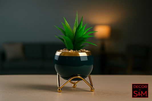 Succulent in teal pot with golden legs on table in medium-lit living space