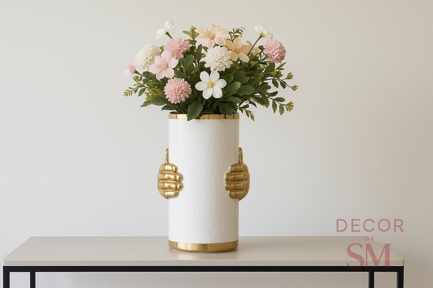 White ceramic vase with golden hand handles on console